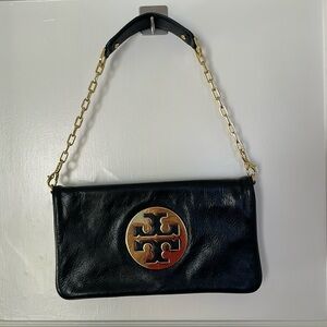 Tory Burch black leather folding/envelope bag. Hardly used.
